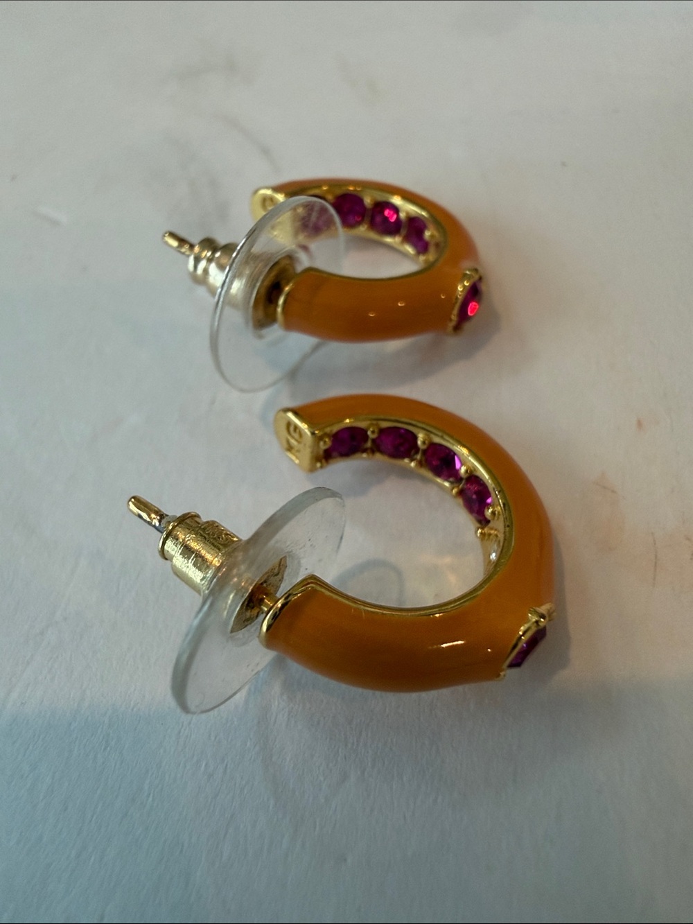 Kurt Geiger
Gold-Tone Orange Hoop Earrings with Pink Gem Accent - Picture 4 of 4